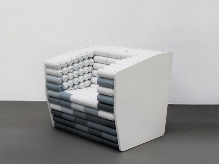 Recycled spray paint can chair